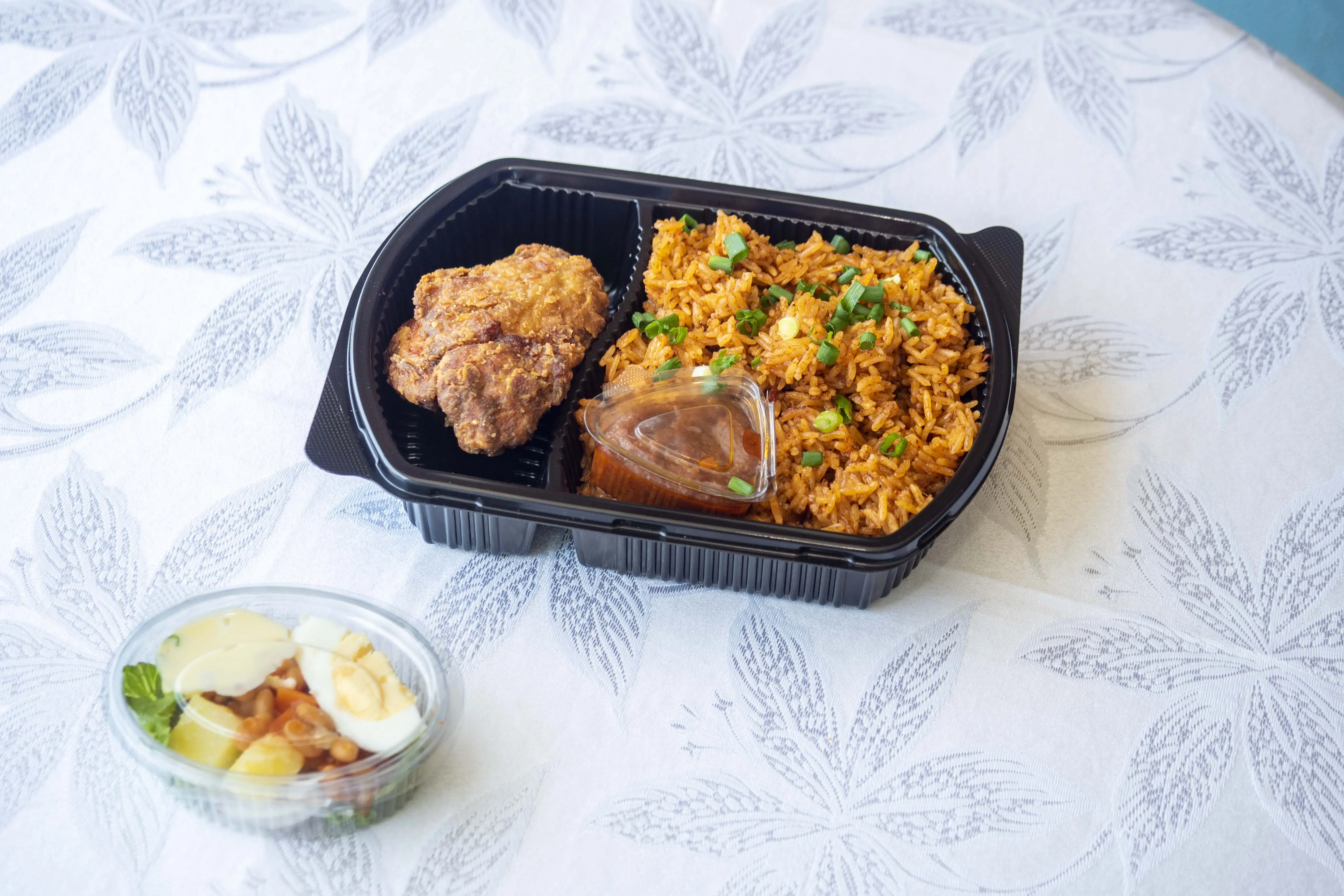 Jollof rice and fried chicken — Diamonds & Pearls Catering