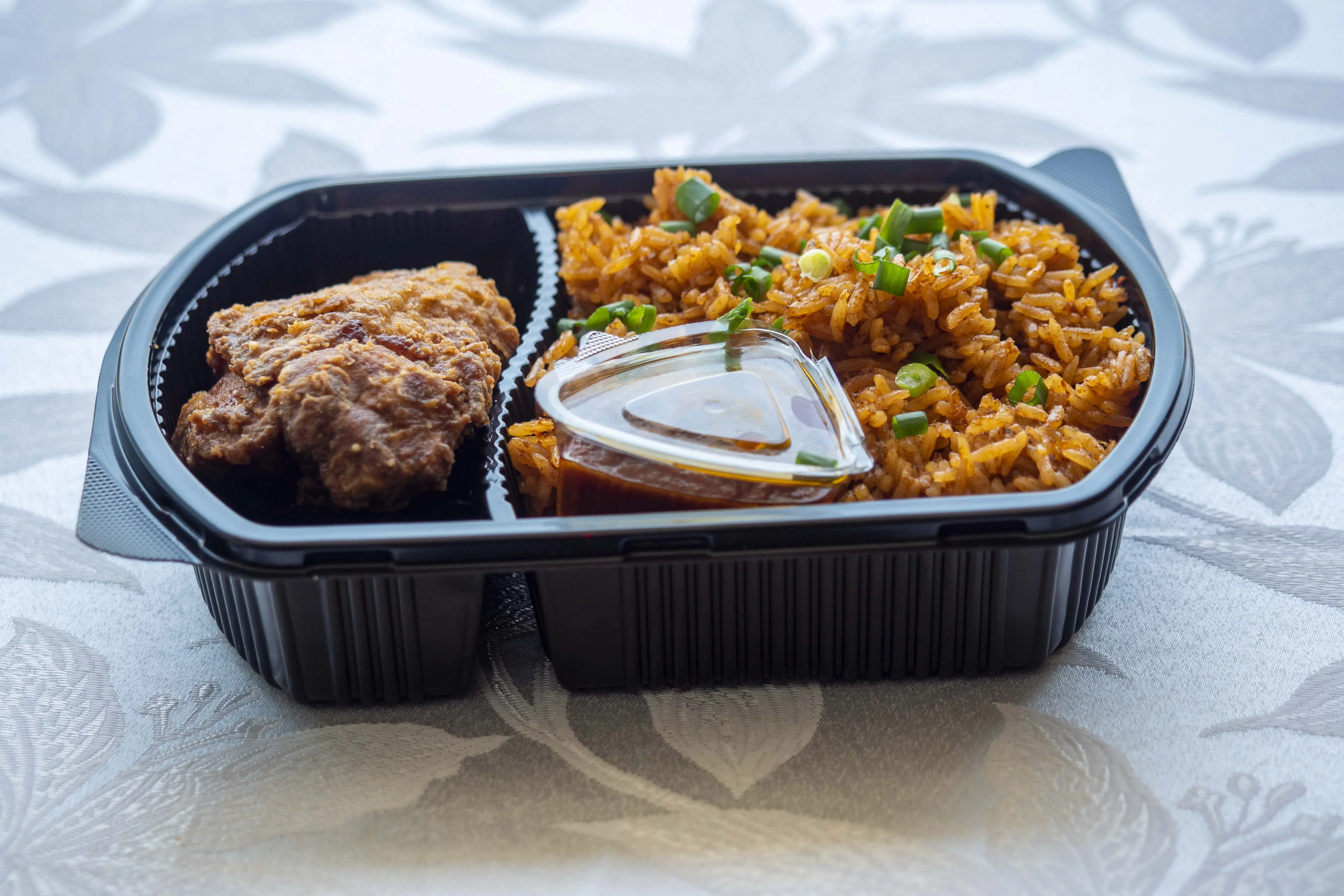 Jollof with Spicy Goat  catering package — Diamonds & Pearls Catering Accra