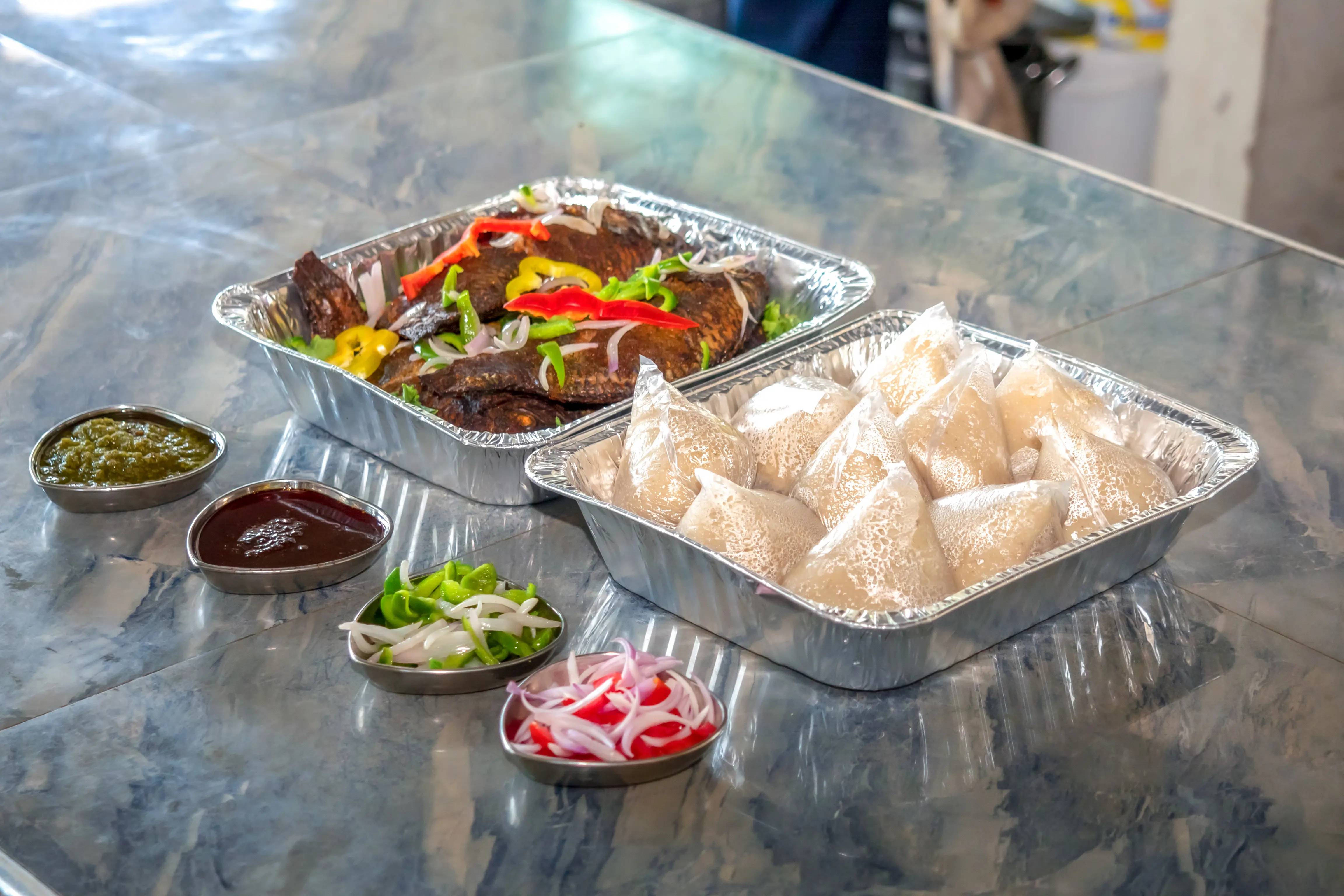 Banku with Tilapia Tray (10 PCS) catering package — Diamonds & Pearls Catering Accra
